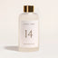 Noles Laundry Perfume Dropss auf Flacshe auf beigem Hintergrund