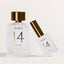 Noles 14 Travelsize lehnt an der normalen Flasche auf beigem Hintergrund