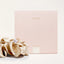 Noles Scrunchie extra large in champagner vor Verpackung